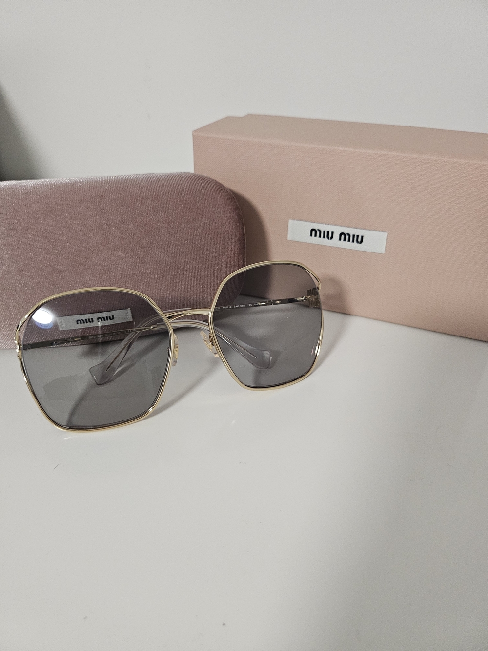 Miu Miu Women's Gold Frame Gray Lens Sunglasses